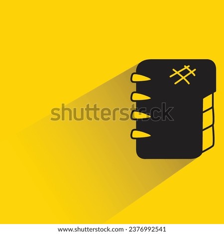 doodle notebook with shadow on yellow background