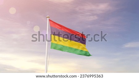 Mauritius national flag waving in beautiful sky. The flag waving with dynamic angle.