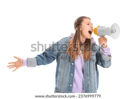 Young woman shouting into megaphone on white background Royalty-Free Stock Photo #2376999779