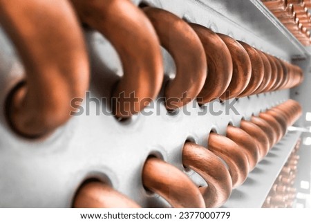 Capturing the Fine Details of an Evaporator Coil in a Close-up Image Royalty-Free Stock Photo #2377000779