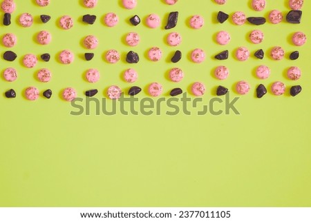 Brown pink stones pebble gems pattern.Green space for advertising text                               