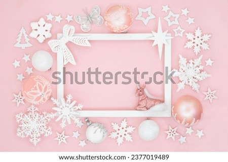 Unicorn north pole Christmas background border with baubles and white frame. Mythical festive magical fantasy design for card, label, gift tag, winter on pink.