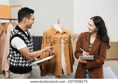 fashion designer, tablet and small business in e commerce, fashion or logistics in remote startup at home. team designer owner working thinking of the color of clothes in store success.