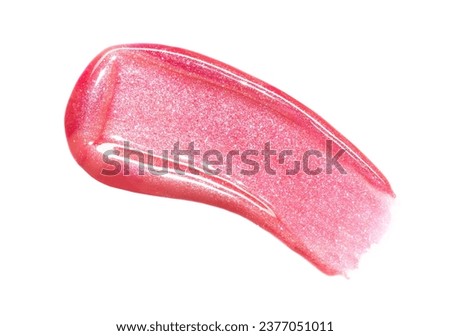 Pink shimmering lipgloss texture isolated on white background. Smudged cosmetic product smear. Makup swatch product sample Royalty-Free Stock Photo #2377051011