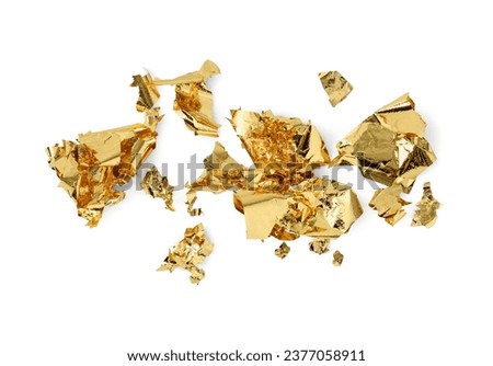 Many pieces of edible gold leaf isolated on white, top view Royalty-Free Stock Photo #2377058911