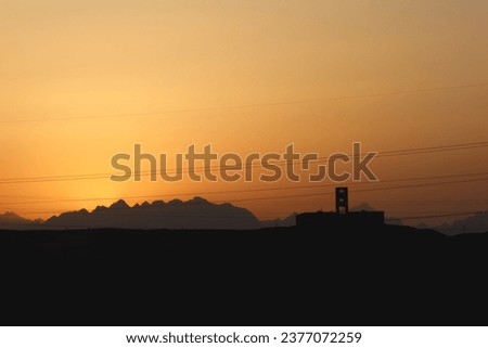 sunset view with mountains silhouette