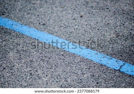 Paid parking, blue lines. parking, blue lines. limited traffic zone, limited traffic zone. Royalty-Free Stock Photo #2377088179