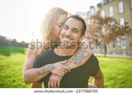 A Beautiful couple having fun outdoors on urban background