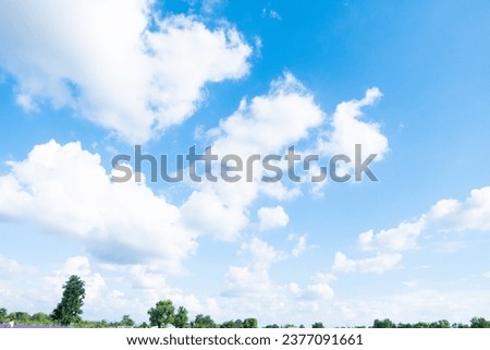 Blue sky with cloudy at sunny day ,Blue Sky Background with White Clouds,vast blue sky,little puffy clouds,copy space. Royalty-Free Stock Photo #2377091661