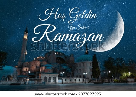 Hos Geldin Ramazan or Welcome the holy month of Ramadan. Hagia Sophia and crescent moon with milkyway. Royalty-Free Stock Photo #2377097395