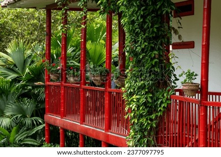 Typical colorful balcony of a coffee farm in Colombia, South America - stock photo