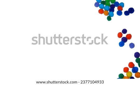 Colorful cotton balls with negative space white background. The picture is perfect for pamphlets, education posters, education promotion, and mindset development.