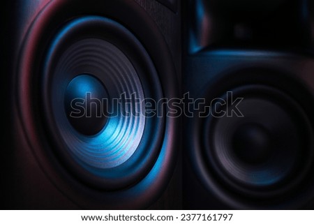 Modern sound speakers as background, closeup view Royalty-Free Stock Photo #2377161797