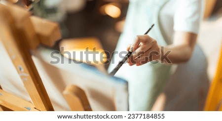 hand of artist with brush painting picture art, creativity, artistic and artwork, painting concept Royalty-Free Stock Photo #2377184855