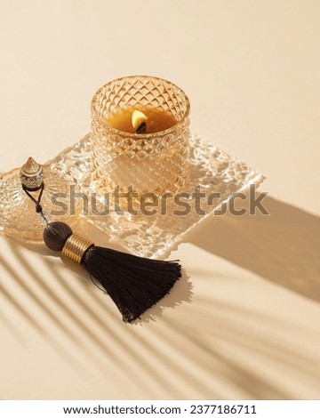 Aroma candle with wooden wick in a glass jar. Handmade candle from  soy wax in glass. Gift concept. Selective focus Royalty-Free Stock Photo #2377186711