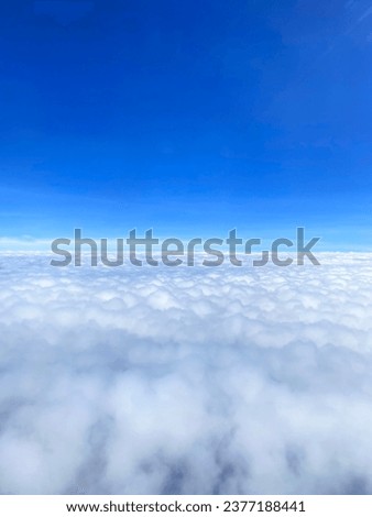 You can see a cloud in the sky Take pictures on an airplane