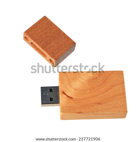 USB memory stick with a nature wood surface isolated on white background 