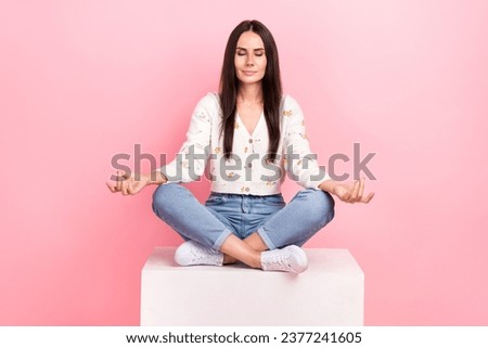 Full length photo of dreamy adorable woman dressed white shirt closed eyes enjoying yoga isolated pink color background