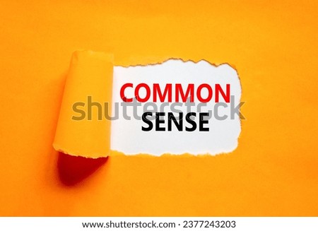Common sense symbol. Concept words Common sense on beautiful white paper. Beautiful orange table orange background. Business, motivational common sense concept. Copy space. Royalty-Free Stock Photo #2377243203