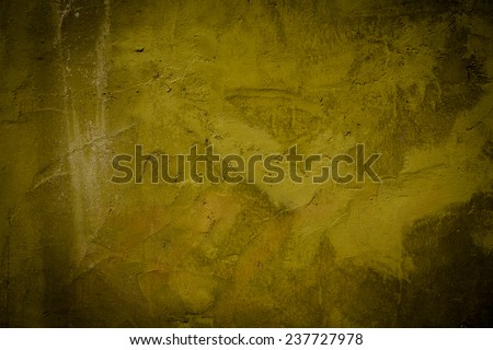vintage grunge background texture with patina-like colors, cracks, and golden brown
