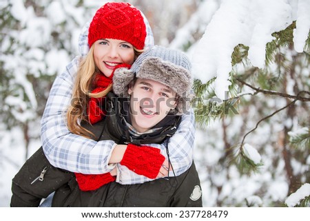 Winter beautiful couple. Family Outdoors