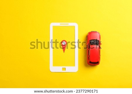 Geolocation Maps Marker point icon in paper cut smartphone with toy cars on yellow background