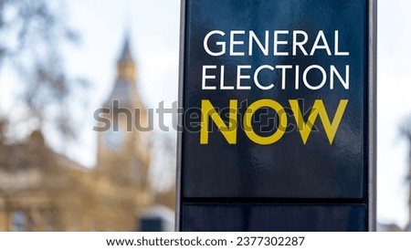 General Election Now written on a sign with Elizabeth Tower and Big Ben in the background Royalty-Free Stock Photo #2377302287