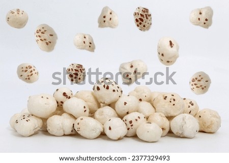 Crispy Lotus pops Seeds or Phool Makhana group isolated on white background