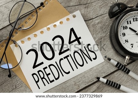 2024 predictions . torn paper on craft paper. text on white page Royalty-Free Stock Photo #2377329869