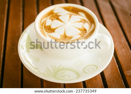 Latte coffee cup in coffee shop - vintage effect style pictures