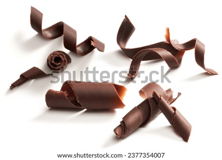 Chocolate curls set. Isolated on white Royalty-Free Stock Photo #2377354007