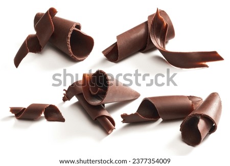 Chocolate curls set. Isolated on white Royalty-Free Stock Photo #2377354009