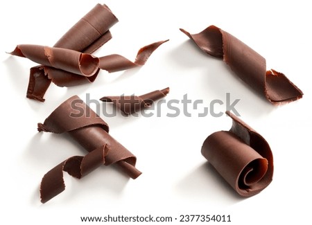 Chocolate curls set. Isolated on white Royalty-Free Stock Photo #2377354011