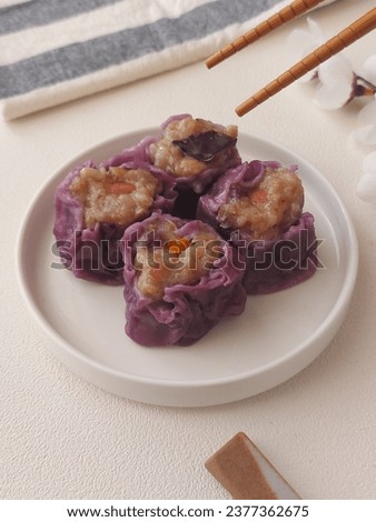 Purple sweet potato dim sum. It is a large range of small Cantonese dishes that are traditionally enjoyed in restaurants for brunch