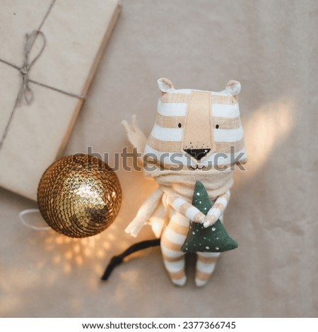 funny tiger toy, symbol of new 2022, a gift and decorations. Christmas, winter, new year concept. Flat lay, top view