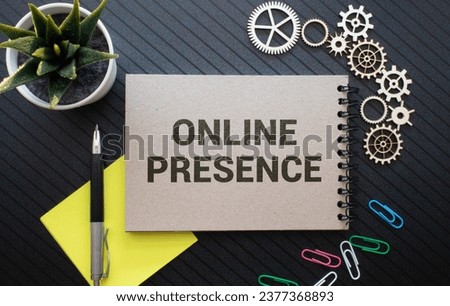 Online presence text written on a notepad with a spring.