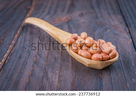 Peanut on wooden background - vintage effect style pictures