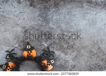 Halloween decor on the gray background