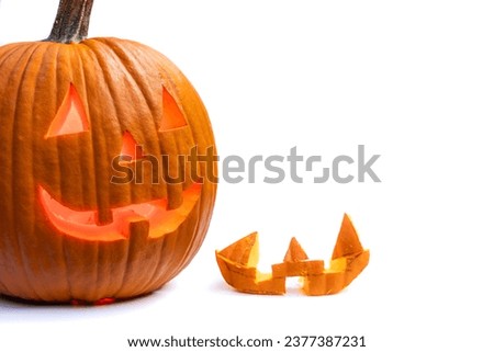 Close up of a smiling halloween pumpkin isolated on a white background