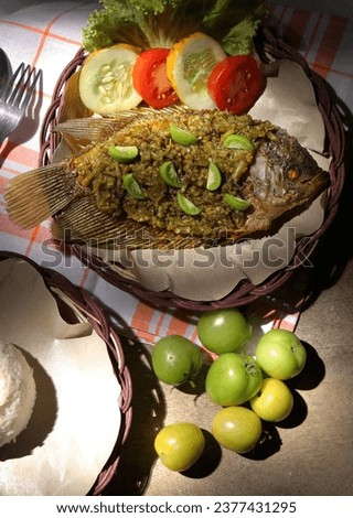 gourami fish cooked with "green chili sauce", it tastes very delicious