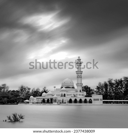 fine art black  white of floating mosque in Terengganu, Malaysia. Soft focus due to long exposure shot.
