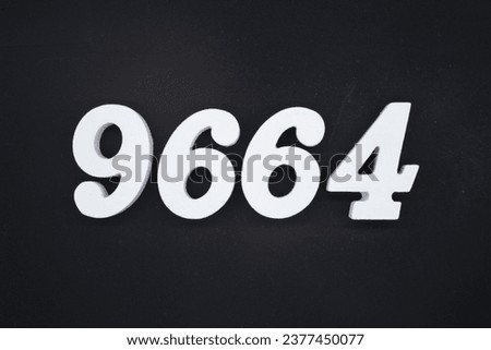 Black for the background. The number 9664 is made of white painted wood.