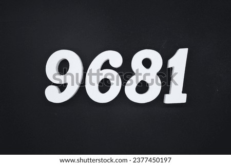 Black for the background. The number 9681 is made of white painted wood.