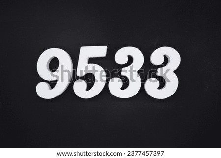 Black for the background. The number 9533 is made of white painted wood.