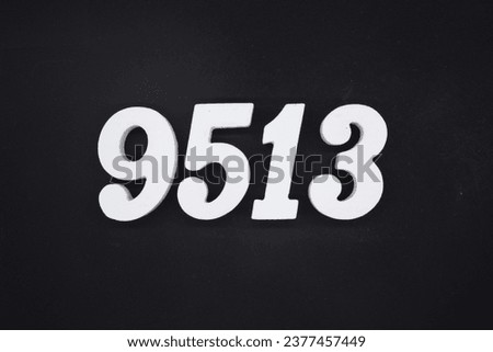 Black for the background. The number 9513 is made of white painted wood.
