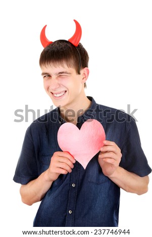 Sly Teenager with Devil Horns and Red Heart Shape Isolated on the White Background