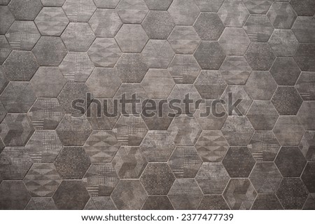 texture of octagonal tiles of different pattern Royalty-Free Stock Photo #2377477739