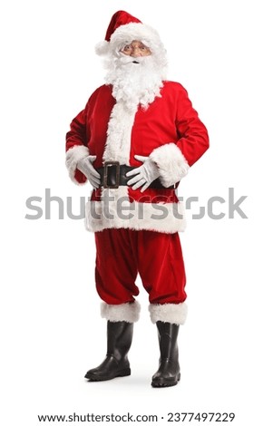 Full length portrait of a smiling happy santa claus isolated on white background