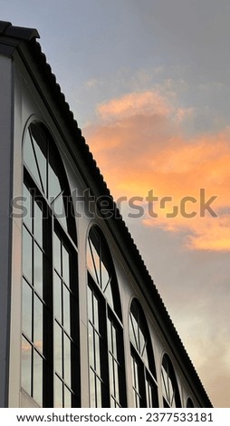 Orange cloud , blue sky and cute windows
