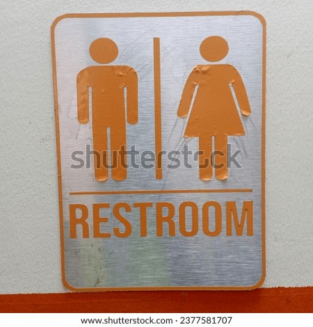 Restroom sign and signal for both male female 